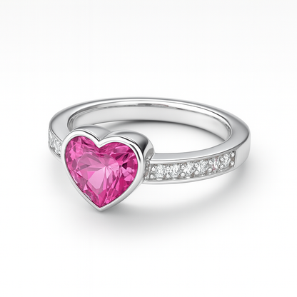 Silver ring with a pink heart-shaped sapphire