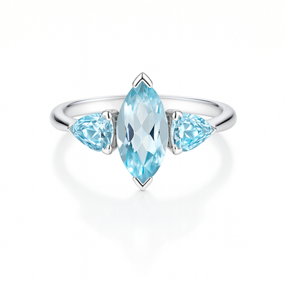 Silver ring with three pear-shaped sky blue topaz